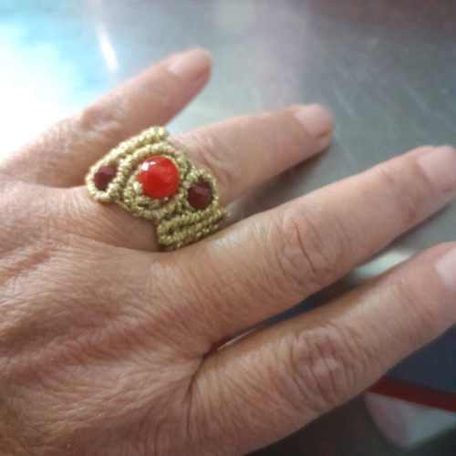 Macrame ring made to order with gold-colored thread and red stones