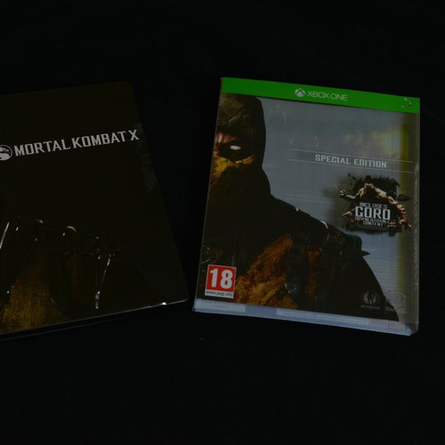 Mortal Kombat X Xbox One steelbook used with sleeve wear