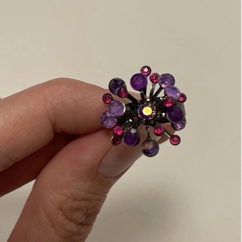Set of 7 rings used with adjustable clasp