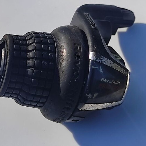 Shimano Tourney RevoShift 3x6 speeds used with grips