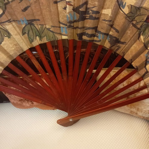 Large decorative Asian art wall fan with peacock feathers and peonies, vintage