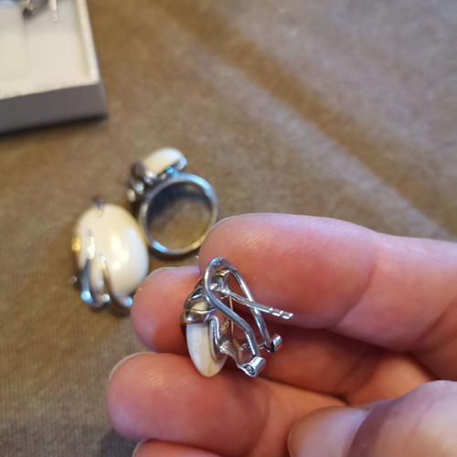 Silver 925 set with white stones used, possibly white coral