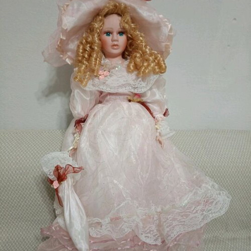 Porcelain doll 50cm new