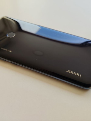 Honor 10 Lite 64GB smartphone used with charger and case