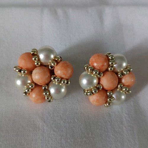 Vintage earrings used in simon white color with golden beads