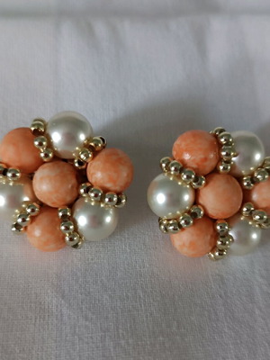 Vintage earrings used in simon white color with golden beads