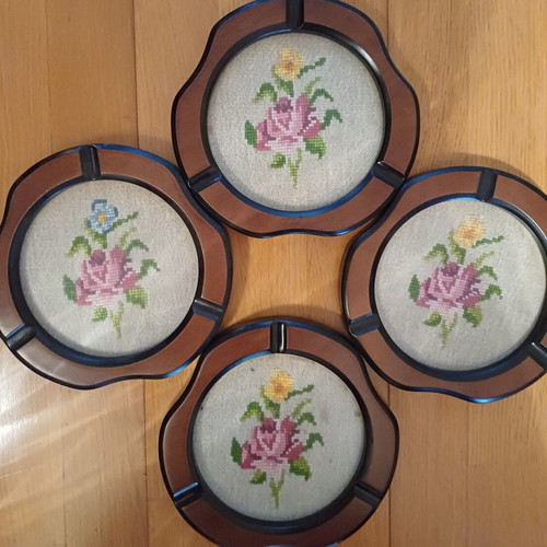 Two large paintings and four small frames __ hand-stitched along with frames__ all