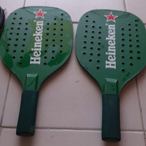 Heineken wooden rackets with plastic case like new