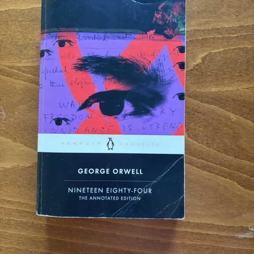 Nineteen Eighty-Four by George Orwell used, cover damaged