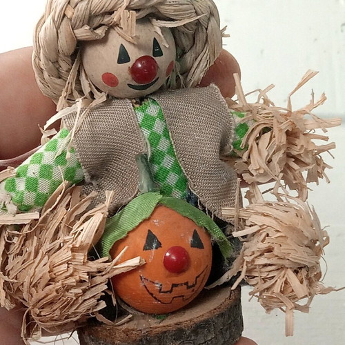 Set of two scarecrow figurines with pumpkin made of natural materials like new