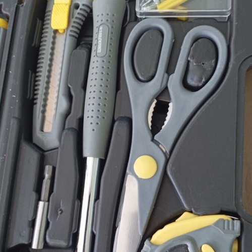 Tool set new with screwdrivers, pliers, scissors and case
