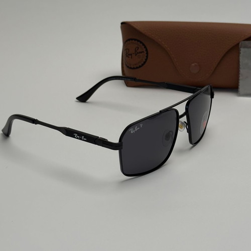 Ray-Ban Navigator sunglasses new, polarized, black and gold