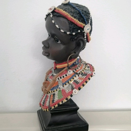 African figurine like new with intricate bead jewelry