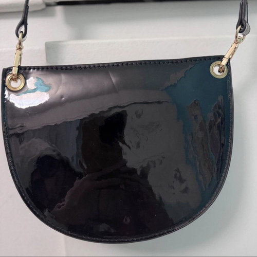 Doca crossbody bag like new, black with gold details