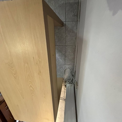 Desk with shelves used, beige color, sturdy hotel equipment