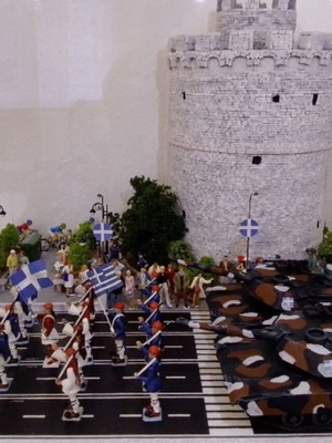 Athena figures diorama of military parade in Thessaloniki with Plexiglas box