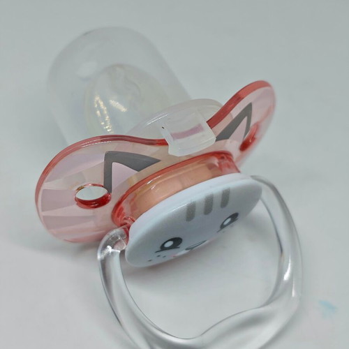 Silicone pacifier with cap and cat design like new, pink