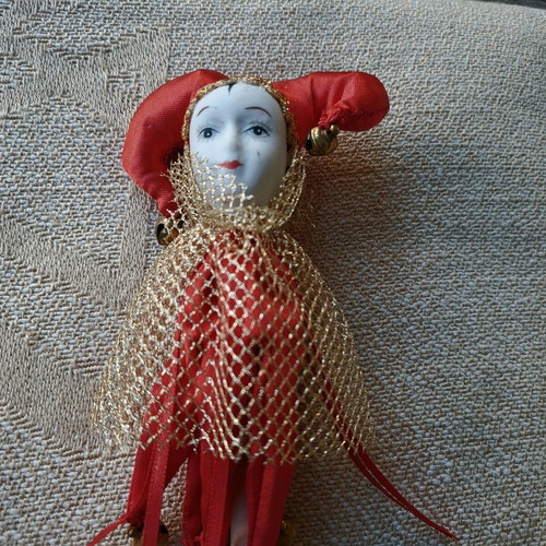 Decorative Harlequin figure on stick like new, red costume