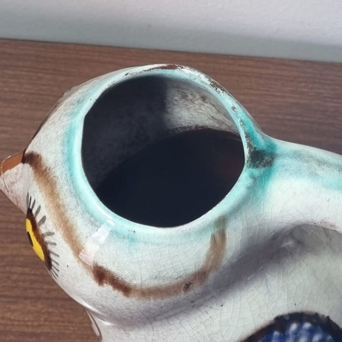 Ceramic owl pitcher used, broken and glued on the beak