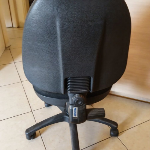 Office armchair with adjustable height and backrest