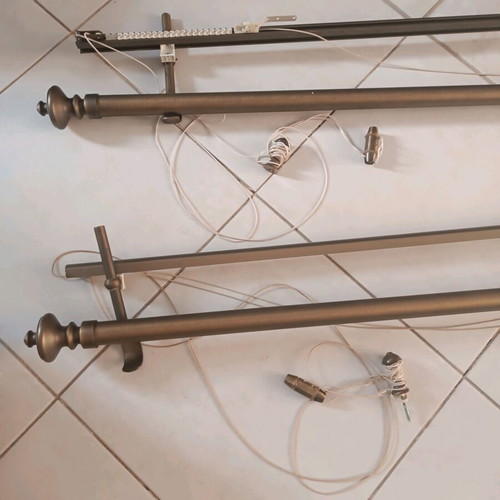 Bronze curtain rods like new with manual mechanism and rail