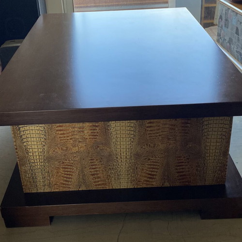 Coffee table like new with dark wood and crocodile leather texture