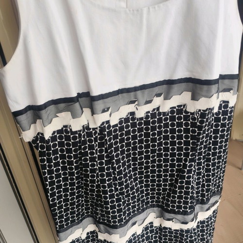 Two-tone dress used with embossed details