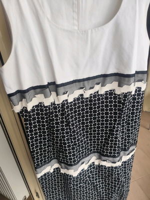 Two-tone dress used with embossed details