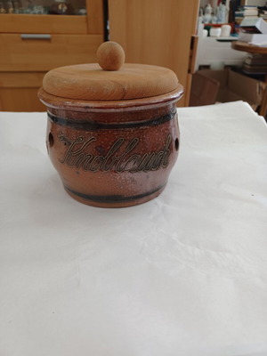 Vintage ceramic garlic container used with wooden lid