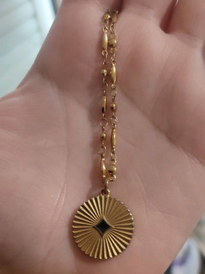 Necklace like new made of stainless steel and gold-plated brass