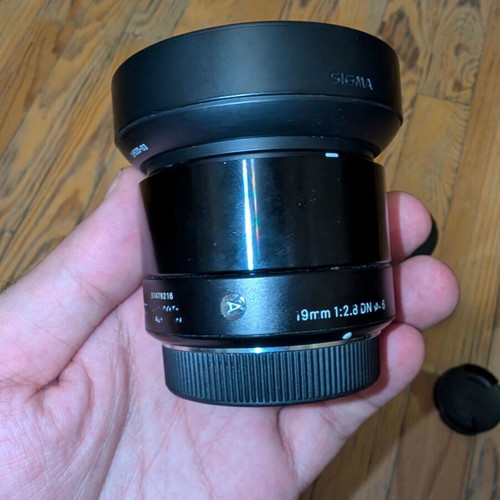 Olympus OM-D E-M10 camera with 2 prime lenses and accessories