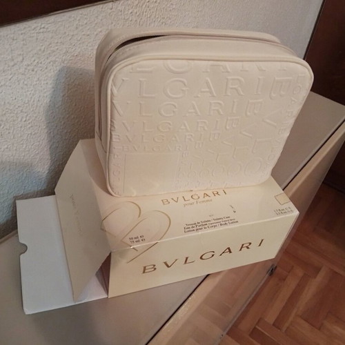 Bvlgari toiletry bag new in beige white color