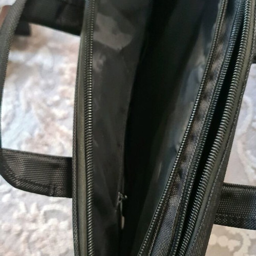 Ormi briefcase like new, hand and shoulder, black-brown