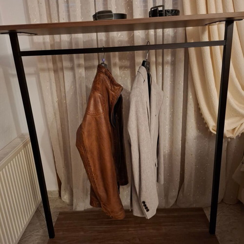 Metal wheeled clothes stand like new