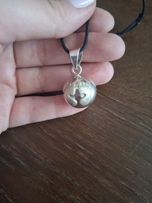 Pregnancy pendant used with black cord and silver bead