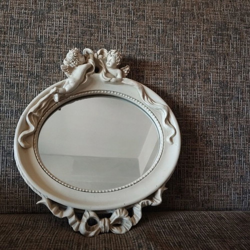 Vintage mirror with angels used, white-beige resin-like material