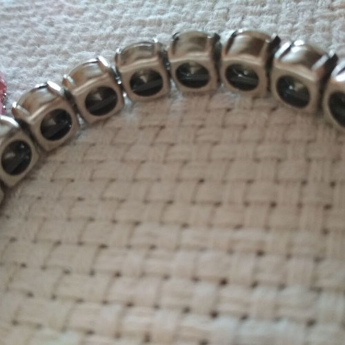 Set of three tennis bracelets like new, pink and white