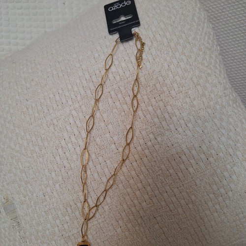 Gold-colored stainless steel necklace with extension