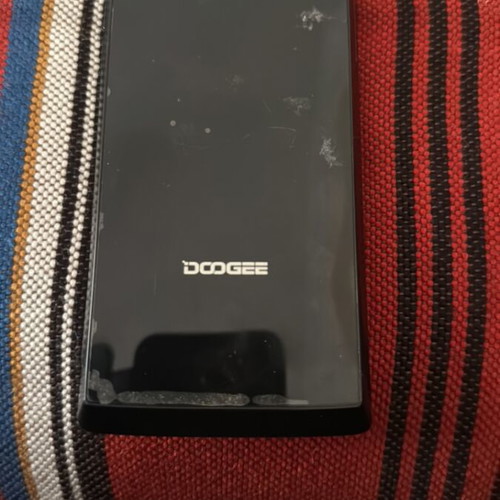 Doogee mobile used for spare parts without charger
