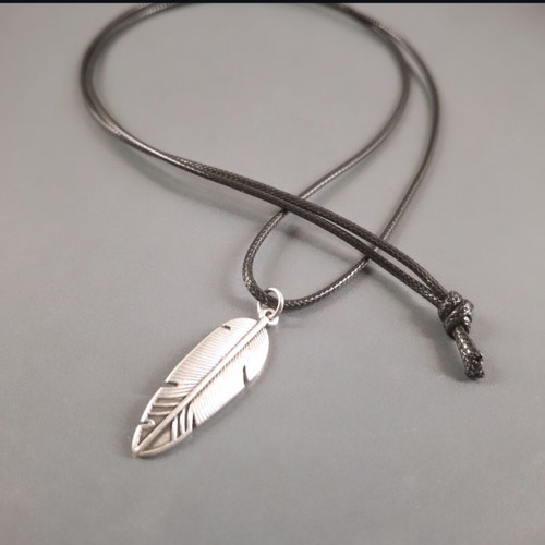 Long necklace with silver leaf pendant and black cord, new
