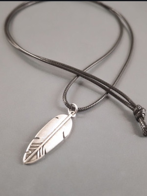 Long necklace with silver leaf pendant and black cord, new