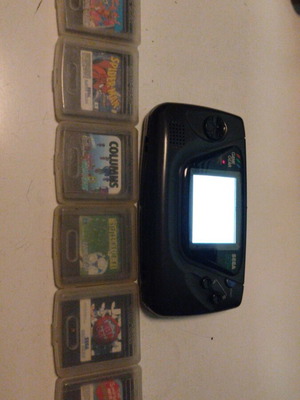 Sega Game Gear console with 7 games