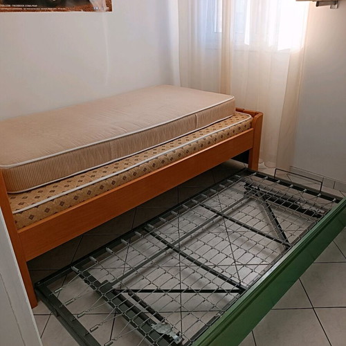 Single bed with used sliding bed and metal frame