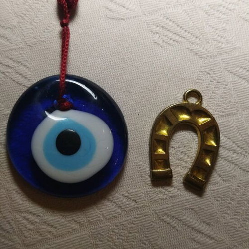 Gouria metal horseshoe and glass eye new