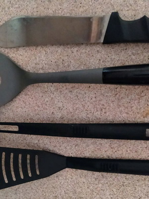 Very large knife and various kitchen utensils like new