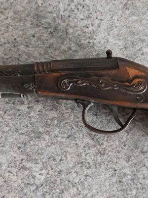 Decorative pistol used, fake metal for decor