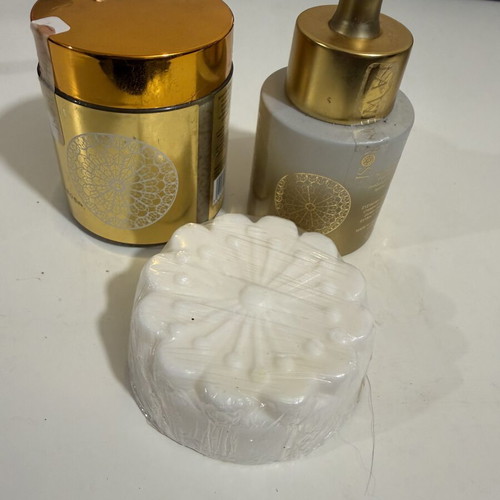 La Vie En Rose skincare set like new with scrub, face oil, and soap