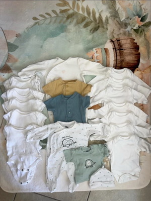 Premature baby clothing bundle like new, includes sleepsuits and vests