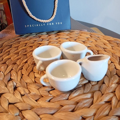 Mini vintage ceramic set used, three cups and milk jug