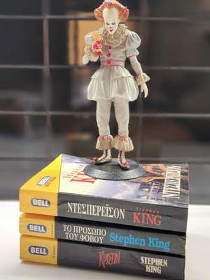Stephen King book collection used with figure